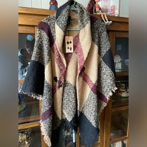 NWT WOMANS CAPE. One size fits all.  100% polyester